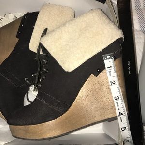 Naughty Monkey brown wedge booties.